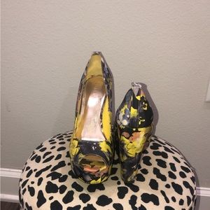 Blue/yellow open toe wedge heels.